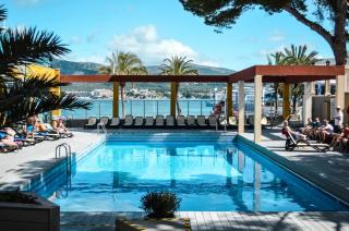 Book Comodoro Playa Hotel online