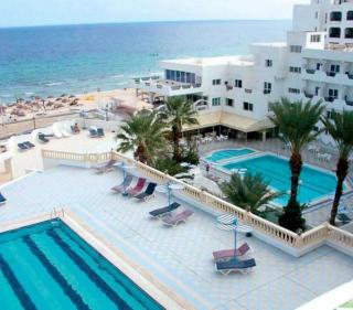 Book Karawan Beach and Resort Hotel online