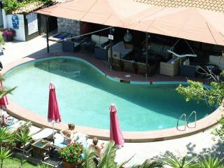 Book Oasis Studios and Apartments online